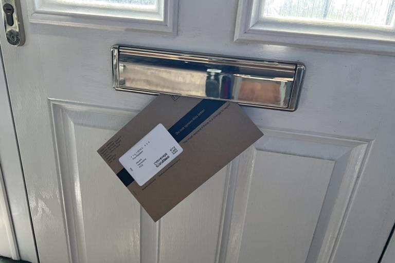 Letter through a letterbox