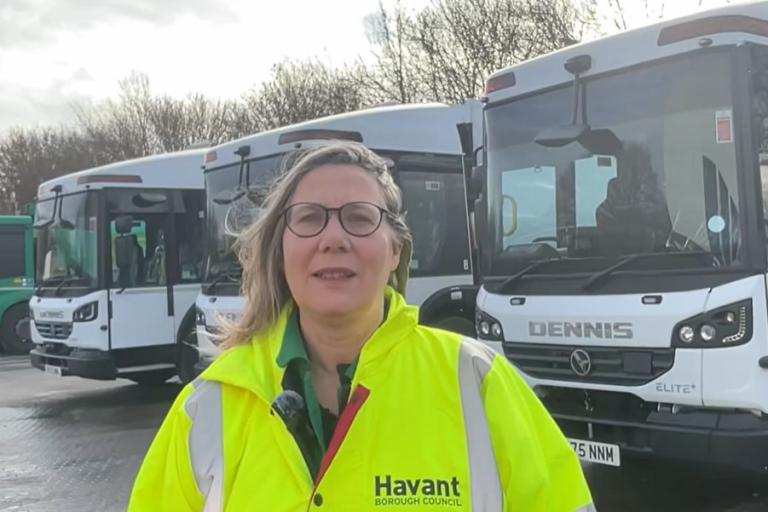 Cllr Shepherd with bin trucks
